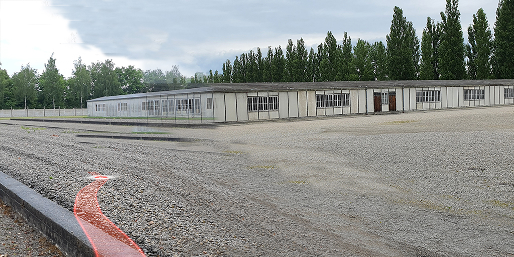 Composite image of barracks of Dachau Concentration Camp with drawn image of baracks and digital path indicated as viewed wthrough AR app.